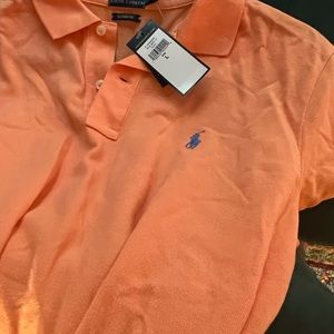 New unworn Light orange/ peach golf shirt (unable to fit & unable to return l)